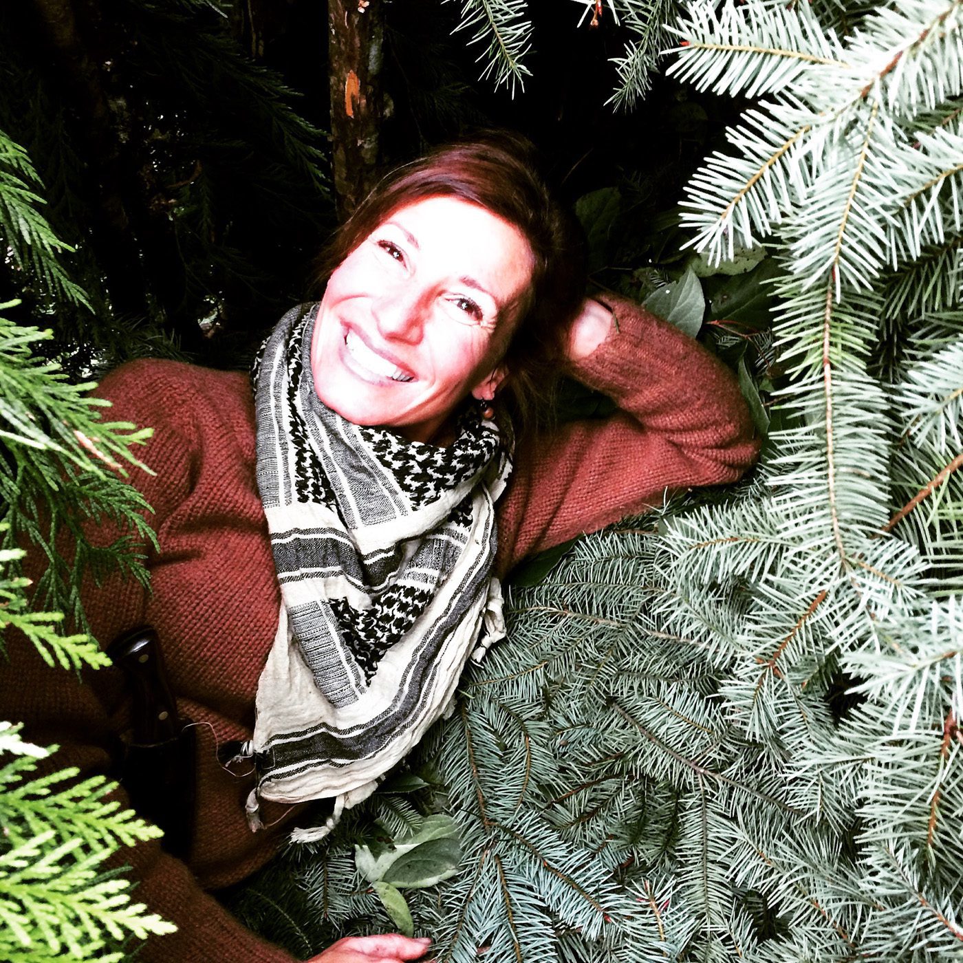Nicole Apelian with holiday tree