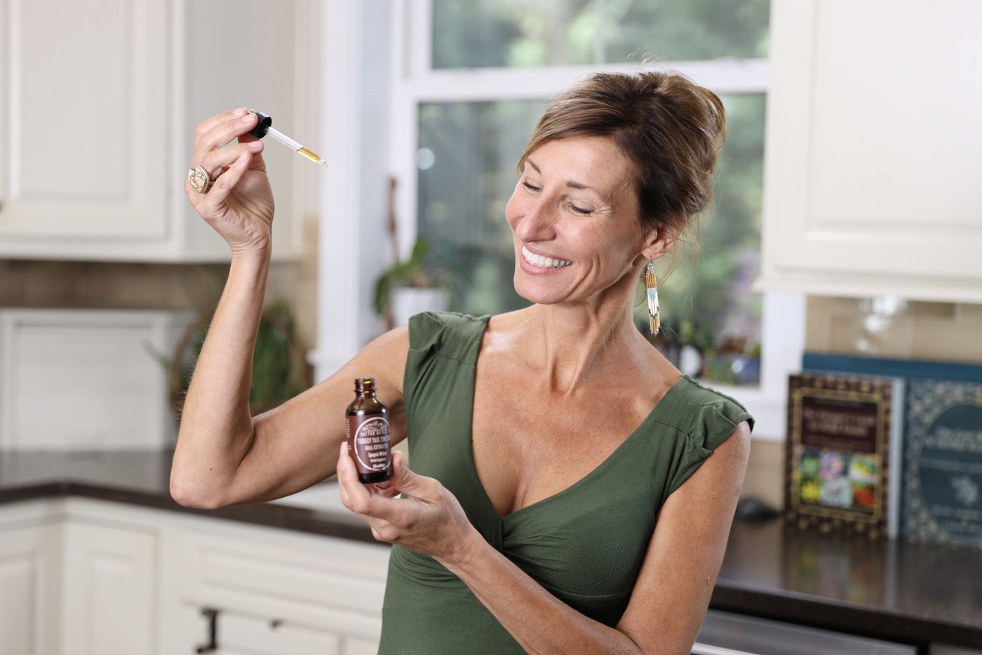 Nicole Apelian taking tincture Nicole Apelian taking tincture