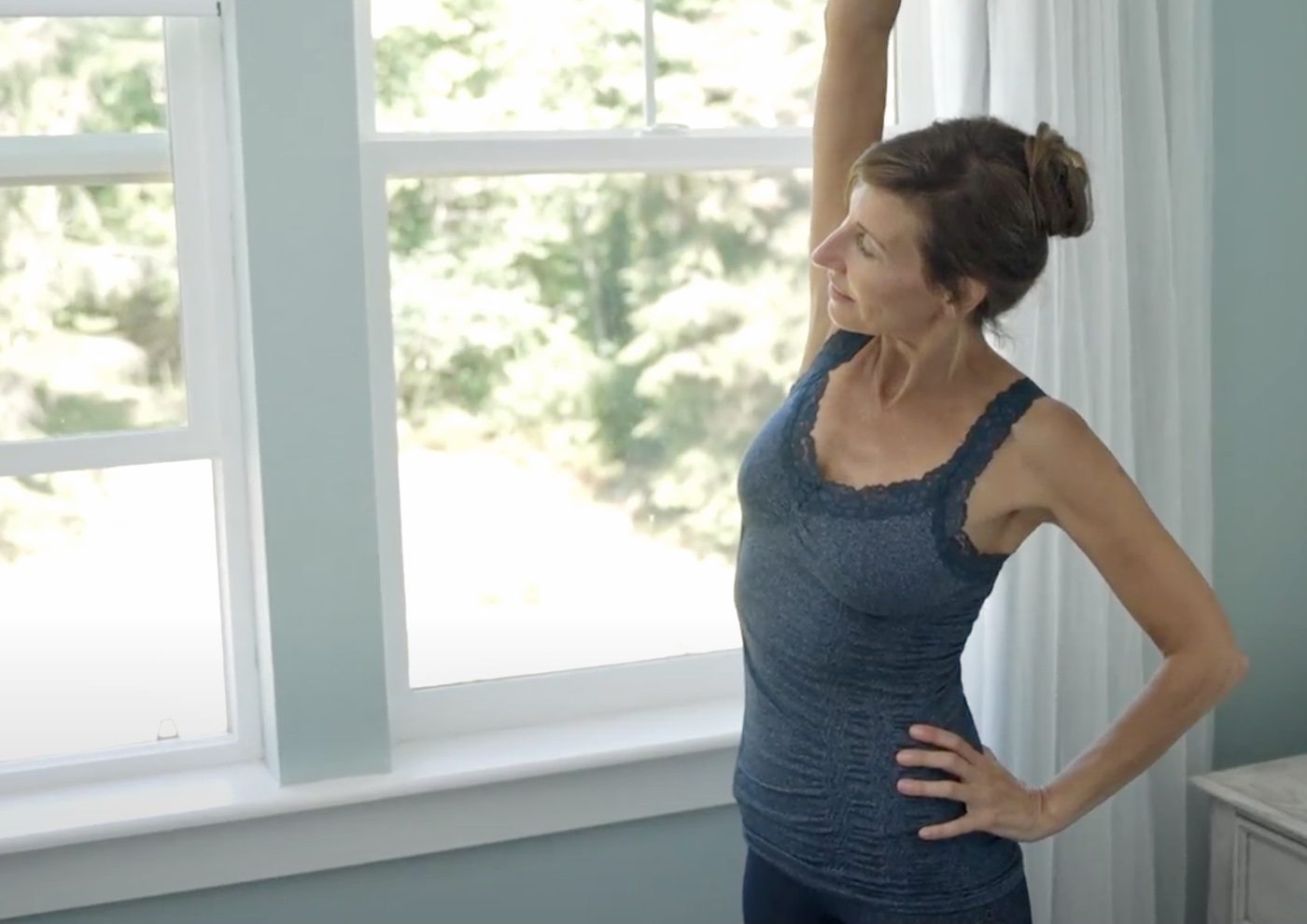 Nicole Apelian wake up stretching at bedroom window