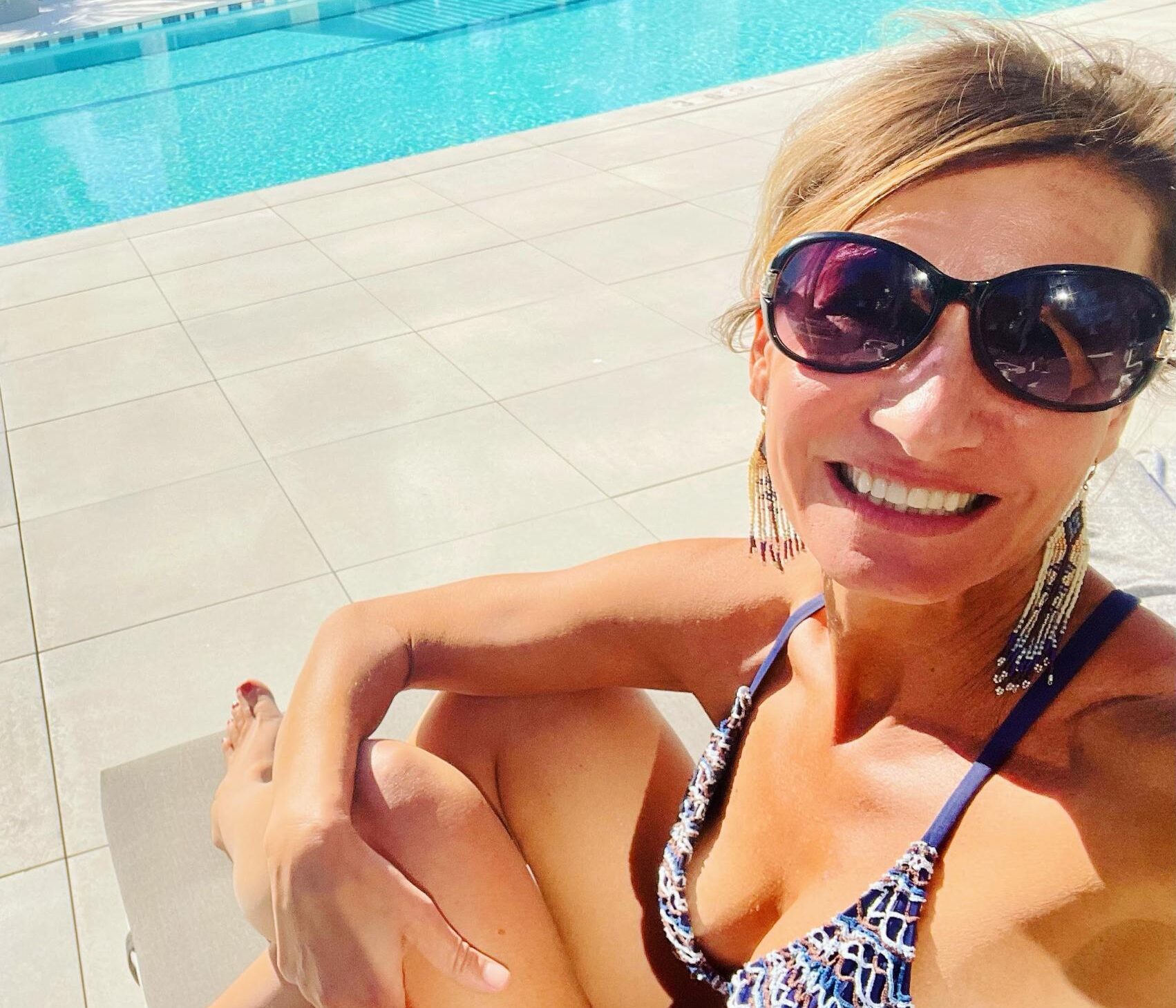 Nicole Apelian poolside