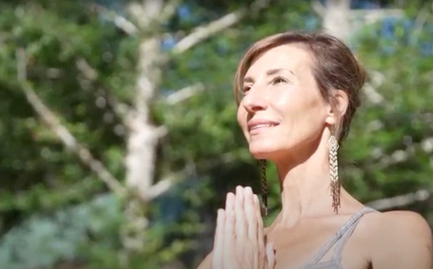 Nicole Apelian with hands clasped