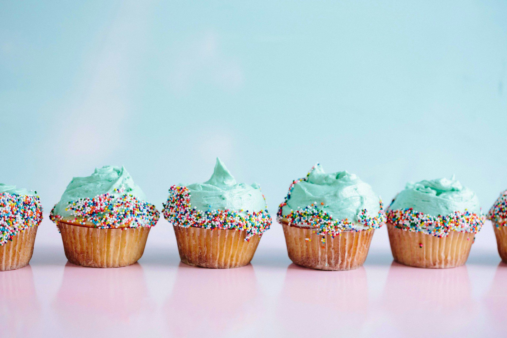 blue cupcakes with sprinkles