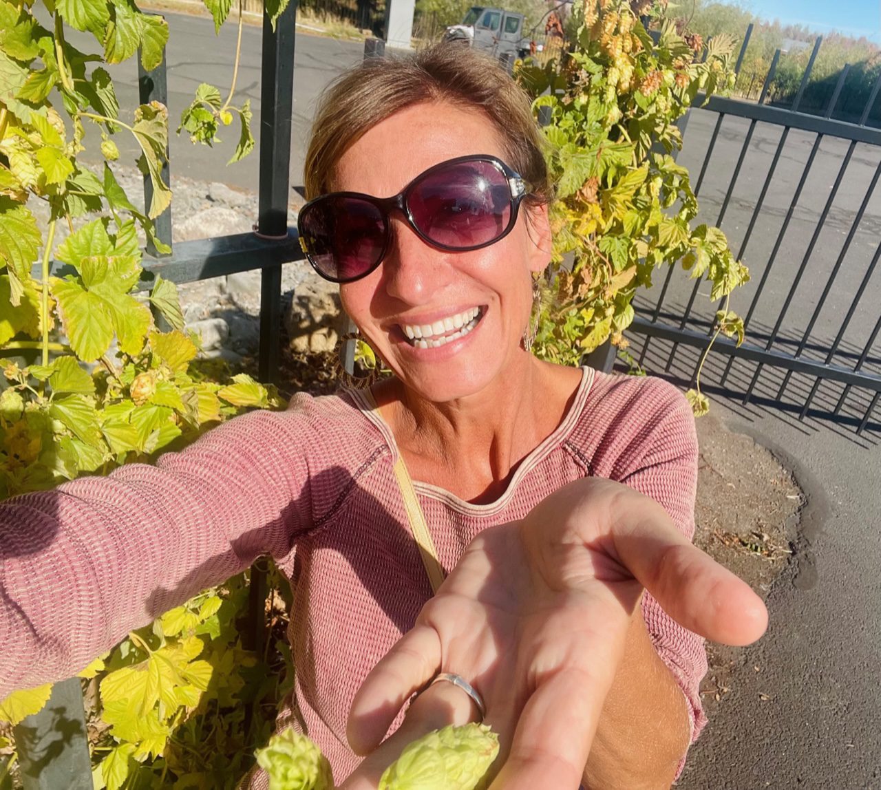 Nicole Apelian holding hops