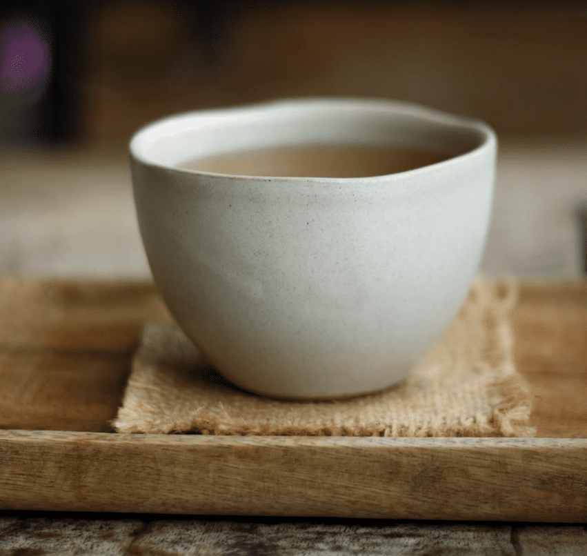 ceramic cup tea tray white ceramic cup of tea on wooden tray