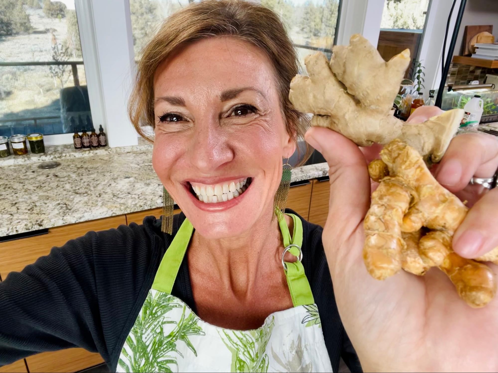 Nicole Apelian holding up ginger root